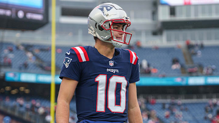 Dec 28, 2024; Foxborough, Massachusetts, USA; New England Patriots quarterback Drake Maye (10) warms up before the start of the game against the Los Angeles Chargers at Gillette Stadium. Mandatory Credit: David Butler II-Imagn Images