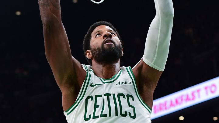 Oct 10, 2026; Boston, Massachusetts, USA;  Boston Celtics forward Paul George (13) dunks the ball during the second half against the Philadelphia 76ers at TD Garden. Mandatory Credit: Bob DeChiara-Imagn Images