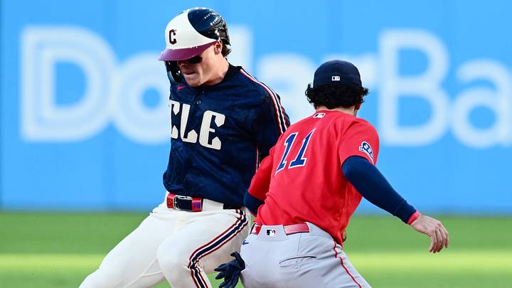 May 29, 2026; Cleveland, Ohio, USA; Cleveland Guardians second baseman Travis Bazzana (37) steals second as Boston Red Sox shortstop Marcelo Mayer (11) is late with the tag during the second inning at Progressive Field. Mandatory Credit: Ken Blaze-Imagn Images