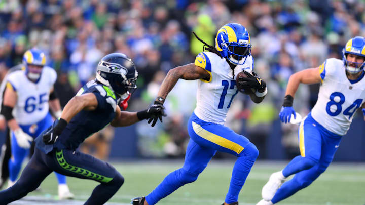Jan 25, 2026; Seattle, WA, USA; Los Angeles Rams wide receiver Davante Adams (17) runs after a catch against the Seattle Seahawks during the first half in the 2026 NFC Championship Game at Lumen Field. Mandatory Credit: Steven Bisig-Imagn Images