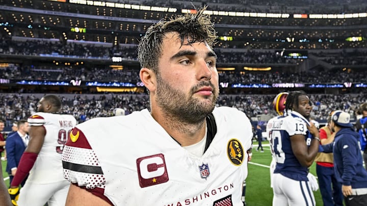 Nov 23, 2023; Arlington, Texas, USA; Washington Commanders quarterback Sam Howell (14) walks off the field after the Commanders loss to the Dallas Cowboys at AT&T Stadium. Mandatory Credit: Jerome Miron-Imagn Images
