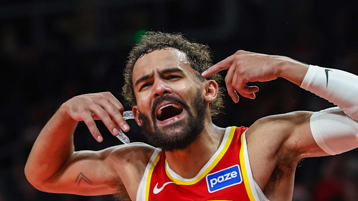 Atlanta Hawks guard Trae Young yells at the referee during the game against the Chicago Bulls during the third quarter at State Farm Arena