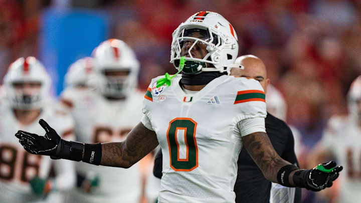 CHECK THIS DUPLICATE Miami Hurricanes defensive back Keionte Scott (0) runs onto the field at the start of the CFP Fiesta Bowl against Ole Miss at the State Farm Stadium, in Glendale, Ariz., on Thursday, Jan. 8, 2026.