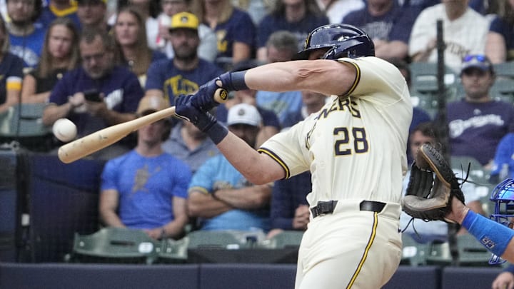 Milwaukee Brewers first baseman Andrew Vaughn (28) hits a home run against the Los Angeles Dodgers at American Family Field. 