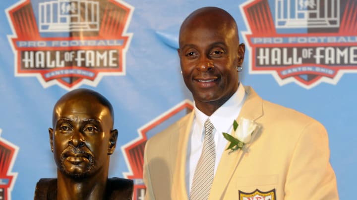 Aug 7, 2010; Canton, OH, USA; Jerry Rice poses with his bust at the 2010 Pro Football Hall of Fame enshrinement ceremony at Fawcett Stadium. Mandatory Credit: Kirby Lee/Image of Sport-Imagn Images