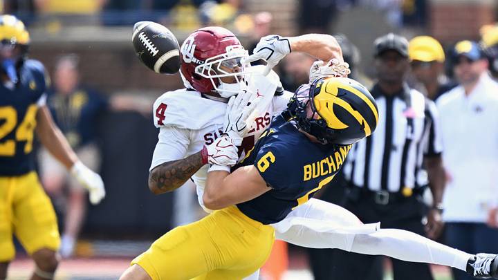Oklahoma Sooners defensive back Courtland Guillory (4) breaks up a pass intended for Michigan Wolverines wide receiver JJ Buchanan (6) during the third quarter at Michigan Stadium.