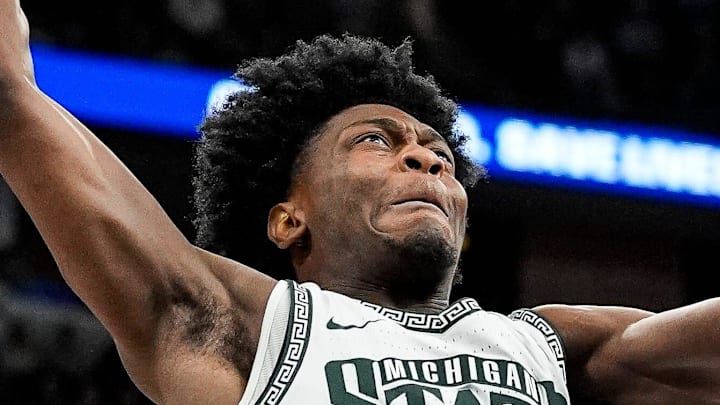 Michigan State guard Trey Fort (9) goes to the basket against UCLA forward Eric Dailey Jr. (3) during the second half of Big Ten tournament quarterfinal at United Center in Chicago on Friday, March 13, 2026. Michigan State guard Trey Fort (9) goes to the basket against UCLA forward Eric Dailey Jr. (3) during the second half of Big Ten tournament quarterfinal at United Center in Chicago on Friday, March 13, 2026.