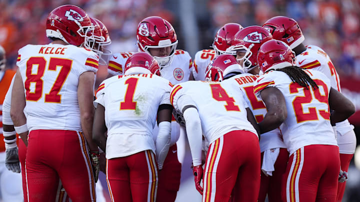 Nov 16, 2025; Denver, Colorado, USA; Members of the Kansas City Chiefs offensive squad huddle in the second quarter against the Denver Broncos at Empower Field at Mile High. Mandatory Credit: Ron Chenoy-Imagn Images