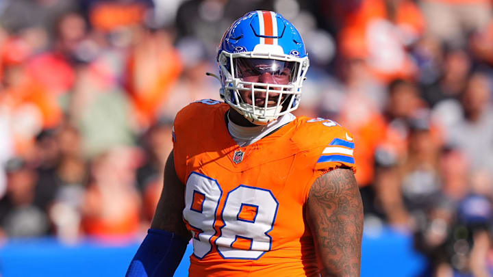 Denver Broncos defensive end John Franklin-Myers (98)
