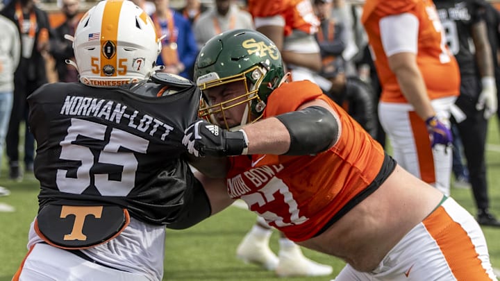 Jan 28, 2025; Mobile, AL, USA; American team defensive lineman Omarr Norman-Lott of Tennessee (55) spars with American team offensive lineman Jackson Slater of Sacramento State (67) during Senior Bowl practice for the American team at Hancock Whitney Stadium. Jan 28, 2025; Mobile, AL, USA; American team defensive lineman Omarr Norman-Lott of Tennessee (55) spars with American team offensive lineman Jackson Slater of Sacramento State (67) during Senior Bowl practice for the American team at Hancock Whitney Stadium.
