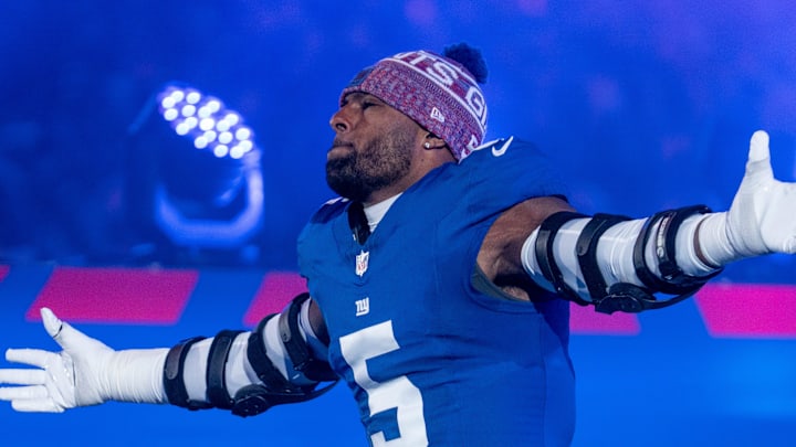 New York Giants linebacker Kayvon Thibodeaux (5) runs out of the tunnel during a Thursday Night Football game New York Giants linebacker Kayvon Thibodeaux (5) runs out of the tunnel during a Thursday Night Football game