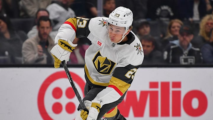 Feb 25, 2026; Los Angeles, California, USA; Vegas Golden Knights left wing Cole Reinhardt (23) shoots on goal against the Los Angeles Kings during the third period at Crypto.com Arena. Mandatory Credit: Gary A. Vasquez-Imagn Images