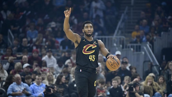 Dec 14, 2025; Cleveland, Ohio, USA; Cleveland Cavaliers guard Donovan Mitchell (45) brings the ball up court in the first quarter against the Charlotte Hornets at Rocket Arena. Mandatory Credit: David Richard-Imagn Images