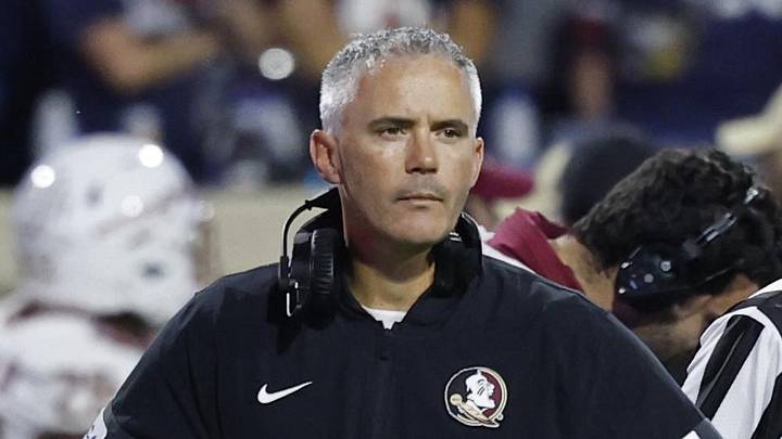 Sep 26, 2025; Charlottesville, Virginia, USA; Florida State Seminoles head coach Mike Norvell looks on during a stoppage in play against the Virginia Cavaliers at Scott Stadium. Mandatory Credit: Geoff Burke-Imagn Images Sep 26, 2025; Charlottesville, Virginia, USA; Florida State Seminoles head coach Mike Norvell looks on during a stoppage in play against the Virginia Cavaliers at Scott Stadium. Mandatory Credit: Geoff Burke-Imagn Images