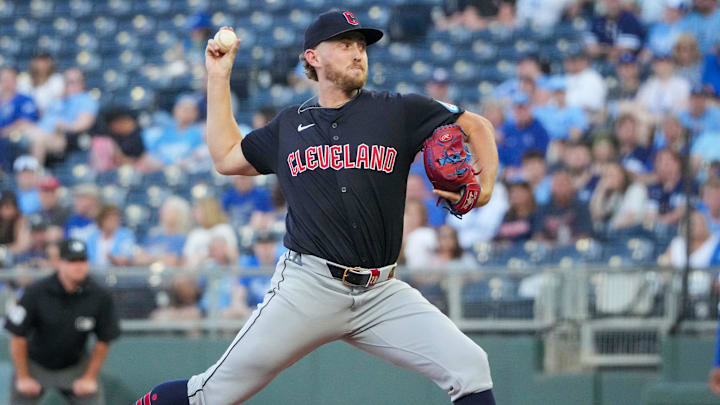 Sep 3, 2024; Kansas City, Missouri, USA; Cleveland Guardians starting pitcher Tanner Bibee (28) delivers a pitch against the Kansas City Royals in the first inning at Kauffman Stadium. Mandatory Credit: Denny Medley-Imagn Images