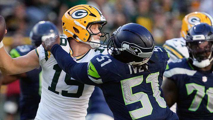 Aug 23, 2025; Green Bay, Wisconsin, USA; Seattle Seahawks linebacker Jared Ivey (51) tackles Green Bay Packers quarterback Taylor Elgersma (19) during the fourth quarter at Lambeau Field. Mandatory Credit: Jeff Hanisch-Imagn Images Aug 23, 2025; Green Bay, Wisconsin, USA; Seattle Seahawks linebacker Jared Ivey (51) tackles Green Bay Packers quarterback Taylor Elgersma (19) during the fourth quarter at Lambeau Field. Mandatory Credit: Jeff Hanisch-Imagn Images