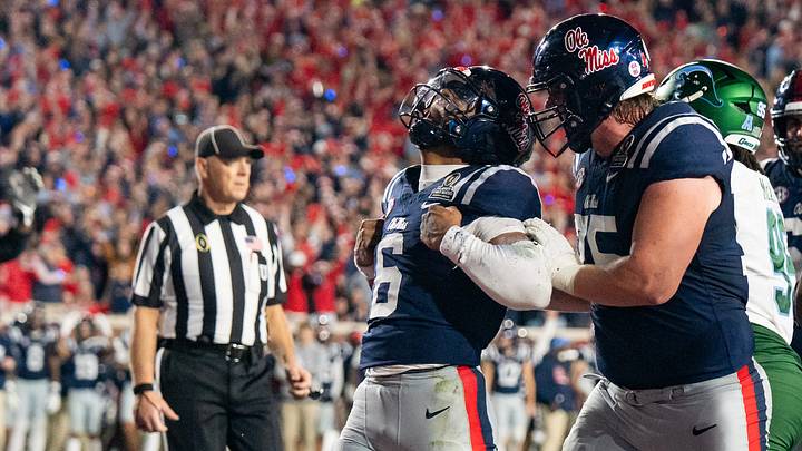Ole Miss quarterback Trinidad Chambliss celebrates his touchdown during the first round of the College Football Playoff Ole Miss quarterback Trinidad Chambliss celebrates his touchdown during the first round of the College Football Playoff