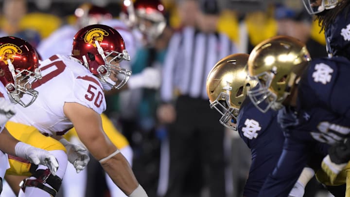 Oct 17, 2015; South Bend, IN, USA; General view of the line of scrimmage as Southern California Trojans center Toa Lobendahn (50) prepares to snap the ball against the Notre Dame Fighting Irish at Notre Dame Stadium.