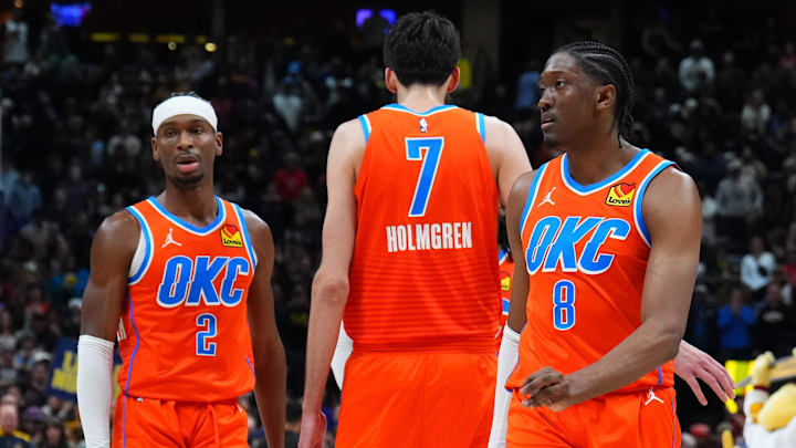 Dec 16, 2023; Denver, Colorado, USA; Oklahoma City Thunder guard Shai Gilgeous-Alexander (2) and forward Chet Holmgren (7) and forward Jalen Williams (8) and forward Jaylin Williams (6) break huddle in the fourth quarter against the Denver Nuggets at Ball Arena. Mandatory Credit: Ron Chenoy-Imagn Images
