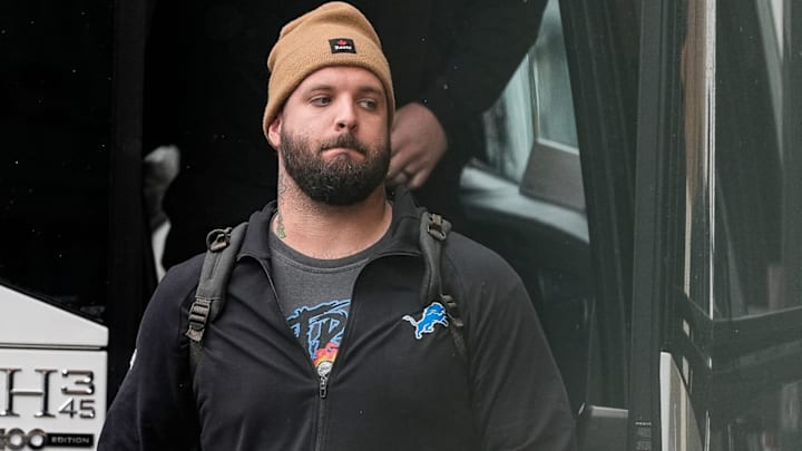 Detroit Lions offensive tackle Taylor Decker (68) walks off the bus as the team arrive at Lambeau Field in Green Bay, Wis. on Sunday, Nov. 3, 2024.