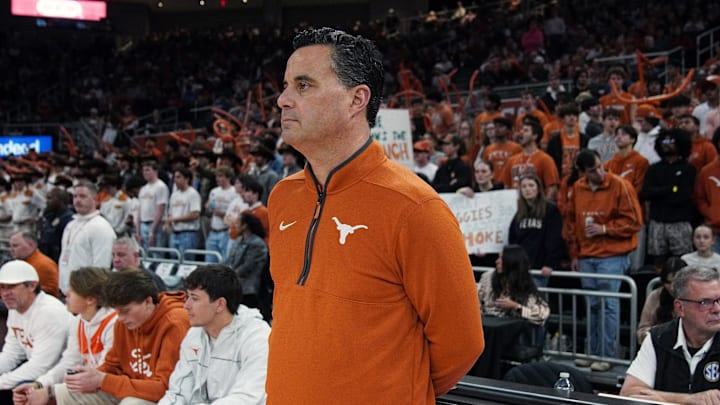 Texas Longhorns head coach Sean Miller waits to meet Texas A&M Aggies head coach Bucky McMillan before the game at Moody Center. 