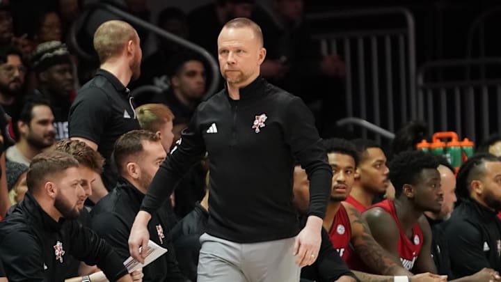 Jan 21, 2025; Dallas, Texas, USA; Louisville Cardinals head coach Pat Kelsey on the bench during the second half against the SMU Mustangs at Moody Coliseum. Mandatory Credit: Raymond Carlin III-Imagn Images