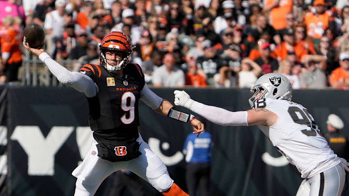 Cincinnati Bengals quarterback Joe Burrow (9) makes in the 1st quarter over Las Vegas Raiders at Paycor Stadium Sunday, November 3, 2024. Cincinnati Bengals quarterback Joe Burrow (9) makes in the 1st quarter over Las Vegas Raiders at Paycor Stadium Sunday, November 3, 2024.