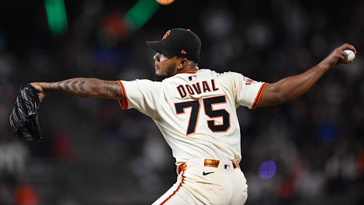 Apr 23, 2025; San Francisco, California, USA; San Francisco Giants pitcher Camilo Doval (75) throws against the Milwaukee Brewers in the ninth inning at Oracle Park.