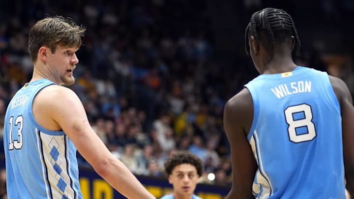 Jan 17, 2026; Berkeley, California, USA; North Carolina Tar Heels center Henri Veesaar (13) and forward Caleb Wilson (8) slap hands during the second half against the California Golden Bears at Haas Pavilion. Mandatory Credit: Darren Yamashita-Imagn Images