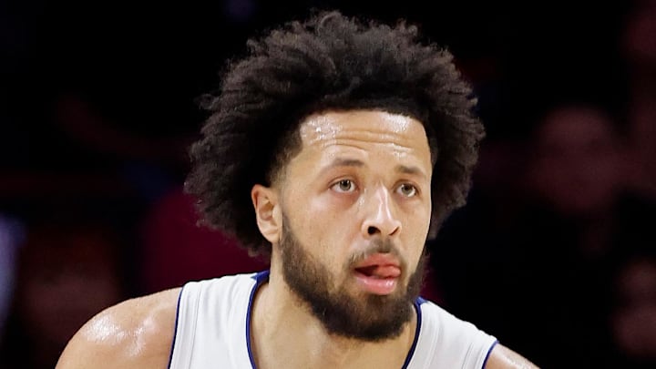 Detroit Pistons guard Cade Cunningham brings the ball up court against the Miami Heat.