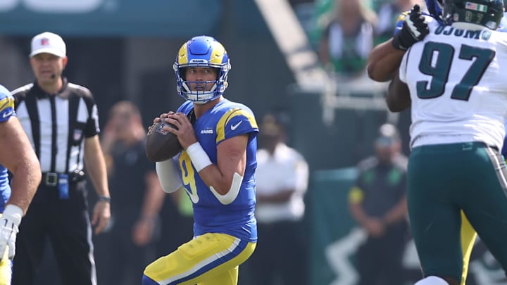Sep 21, 2025; Philadelphia, Pennsylvania, USA; Los Angeles Rams quarterback Matthew Stafford (9) drops back to pass against the Philadelphia Eagles during the first half at Lincoln Financial Field. Mandatory Credit: Bill Streicher-Imagn Images Sep 21, 2025; Philadelphia, Pennsylvania, USA; Los Angeles Rams quarterback Matthew Stafford (9) drops back to pass against the Philadelphia Eagles during the first half at Lincoln Financial Field. Mandatory Credit: Bill Streicher-Imagn Images