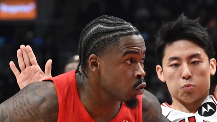 Toronto Raptors guard Jamal Shead drives against Chicago Bulls guard Yuki Kawamura