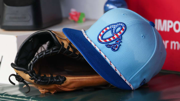 Jul 4, 2025; Atlanta, Georgia, USA; A detailed view of the Baltimore Orioles 4th of July hat in the dugout against the Atlanta Braves in the third inning at Truist Park. 