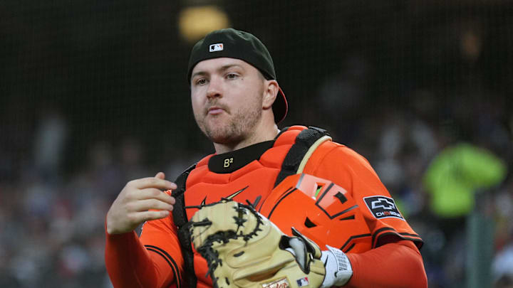Sep 12, 2025; San Francisco, California, USA; San Francisco Giants catcher Patrick Bailey (14) tosses a ball out of play during the first inning against the Los Angeles Dodgers at Oracle Park. Mandatory Credit: Darren Yamashita-Imagn Images