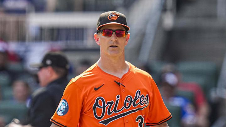 Jul 5, 2025; Cumberland, Georgia, USA; Baltimore Orioles interim manager Tony Mansolino (36) on the field during the game against the Atlanta Braves at Truist Park. Mandatory Credit: Dale Zanine-Imagn Images