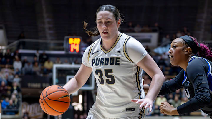 Purdue Sophomore Lana McCarthy (35) drives to the basket.