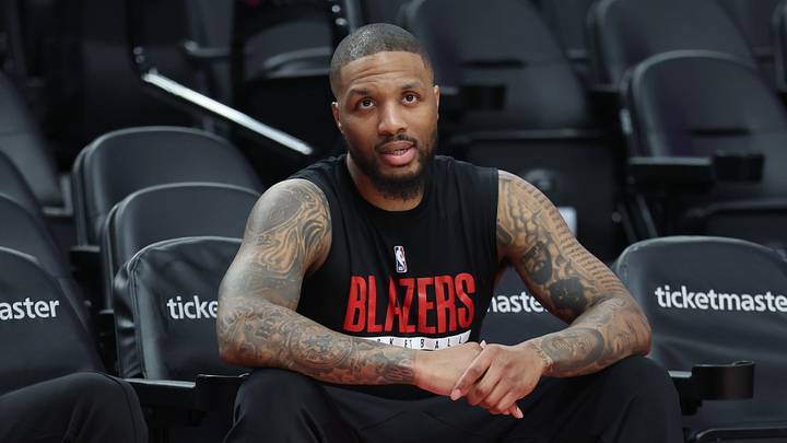 Apr 10, 2026; Portland, Oregon, USA;  Portland Trail Blazers guard Damian Lillard (0) watches his teammates during warm ups before the Trail Blazers play against the LA Clippers at Moda Center. Mandatory Credit: Jaime Valdez-Imagn Images