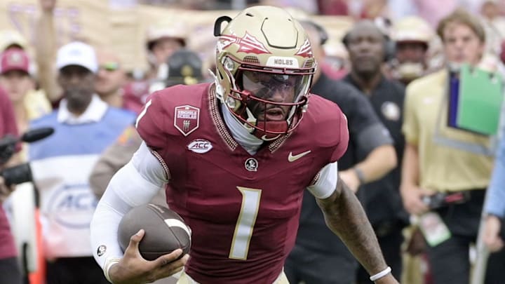 Aug 30, 2025; Tallahassee, Florida, USA; Florida State Seminoles quarterback Tommy Castellanos (1) runs for a touchdown against the Alabama Crimson Tide during the first half at Doak S. Campbell Stadium. Mandatory Credit: Melina Myers-Imagn Images Aug 30, 2025; Tallahassee, Florida, USA; Florida State Seminoles quarterback Tommy Castellanos (1) runs for a touchdown against the Alabama Crimson Tide during the first half at Doak S. Campbell Stadium. Mandatory Credit: Melina Myers-Imagn Images