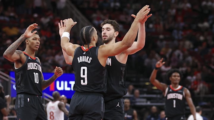 Nov 15, 2024; Houston, Texas, USA; Houston Rockets forward Dillon Brooks (9) celebrates with center Alperen Sengun (28) after making a basket during the second quarter against the Los Angeles Clippers at Toyota Center. Mandatory Credit: Troy Taormina-Imagn Images