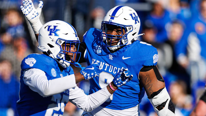 Nov 16, 2024; Lexington, Kentucky, USA; Kentucky Wildcats defensive lineman Keeshawn Silver (9) celebrates with defensive back Jordan Lovett (25) after Lovett intercepts a pass during the second quarter against the Murray State Racers at Kroger Field. Mandatory Credit: Jordan Prather-Imagn Images Nov 16, 2024; Lexington, Kentucky, USA; Kentucky Wildcats defensive lineman Keeshawn Silver (9) celebrates with defensive back Jordan Lovett (25) after Lovett intercepts a pass during the second quarter against the Murray State Racers at Kroger Field. Mandatory Credit: Jordan Prather-Imagn Images