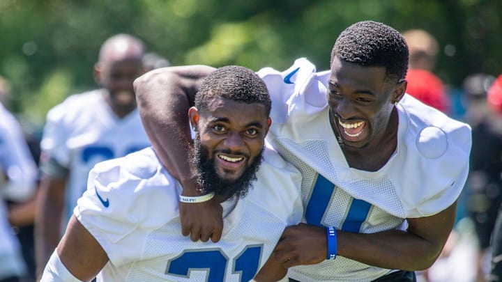 Detroit Lions cornerbacks Amik Robertson (21) and Terrion Arnold (0) run off the field after practice Detroit Lions cornerbacks Amik Robertson (21) and Terrion Arnold (0) run off the field after practice