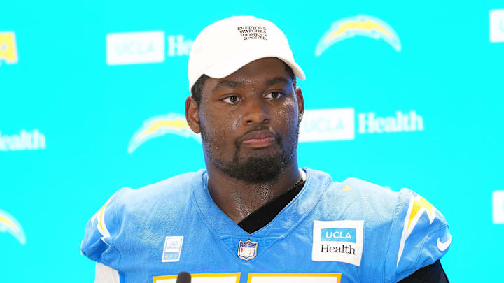 Jul 25, 2025; El Segundo, CA, USA; Los Angeles Chargers guard Zion Johnson (77) during training camp press conference at The Bolt. Mandatory Credit: Kirby Lee-Imagn Images Jul 25, 2025; El Segundo, CA, USA; Los Angeles Chargers guard Zion Johnson (77) during training camp press conference at The Bolt. Mandatory Credit: Kirby Lee-Imagn Images