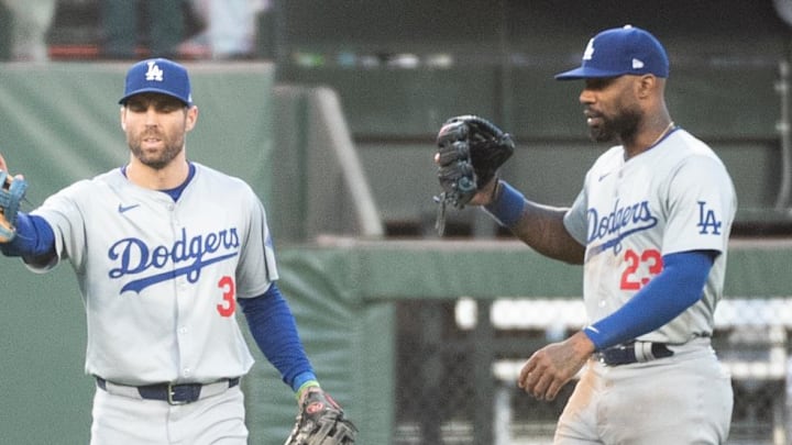 Dodgers Chris Taylor (3) and Jason Heyward (23) celebrate after defeating the San Francisco Giants at Oracle Park on June 29, 2024. Dodgers Chris Taylor (3) and Jason Heyward (23) celebrate after defeating the San Francisco Giants at Oracle Park on June 29, 2024.
