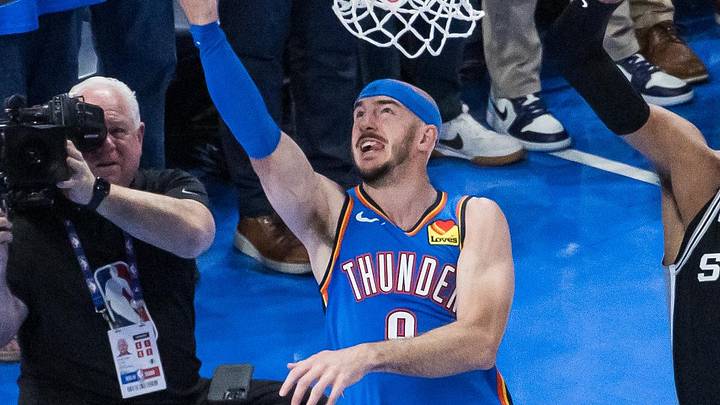 May 18, 2026; Oklahoma City, Oklahoma, USA; Oklahoma City Thunder guard Alex Caruso (9) shoots while defended by San Antonio Spurs center Victor Wembanyama (1) in double overtime during game one of the western conference finals for the 2026 NBA playoffs at Paycom Center. Mandatory Credit: Brett Rojo-Imagn Images May 18, 2026; Oklahoma City, Oklahoma, USA; Oklahoma City Thunder guard Alex Caruso (9) shoots while defended by San Antonio Spurs center Victor Wembanyama (1) in double overtime during game one of the western conference finals for the 2026 NBA playoffs at Paycom Center. Mandatory Credit: Brett Rojo-Imagn Images