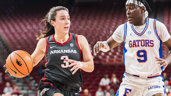 Arkansas guard Izzy Higginbottom handles the ball against the Florida Gators. Florida won 108-78. Arkansas guard Izzy Higginbottom handles the ball against the Florida Gators. Florida won 108-78.