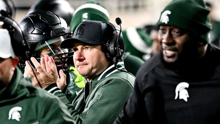 Michigan State's head coach Jonathan Smith, center, claps after Nathan Carter's touchdown against Purdue during the second quarter on Friday, Nov. 22, 2024, at Spartan Stadium in East Lansing. Michigan State's head coach Jonathan Smith, center, claps after Nathan Carter's touchdown against Purdue during the second quarter on Friday, Nov. 22, 2024, at Spartan Stadium in East Lansing.