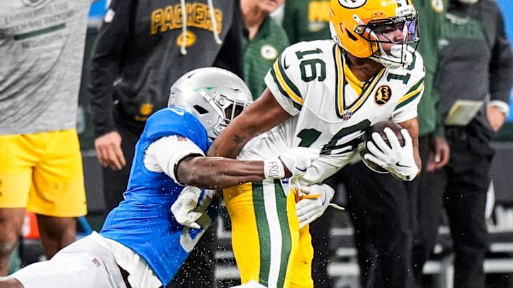 Detroit Lions cornerback Terrion Arnold (6) tackles Green Bay Packers cornerback Bo Melton (16) 