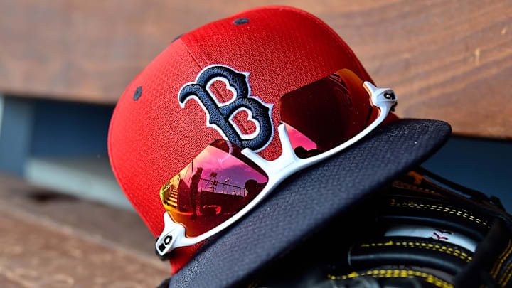 A detailed view of a Boston Red Sox cap, sunglasses and glove in the dugout during a spring training game between the Washington Nationals and the Boston Red Sox at FITTEAM Ballpark of the Palm Beaches on March 5, 2019, in West Palm Beach, Fla. A detailed view of a Boston Red Sox cap, sunglasses and glove in the dugout during a spring training game between the Washington Nationals and the Boston Red Sox at FITTEAM Ballpark of the Palm Beaches on March 5, 2019, in West Palm Beach, Fla.