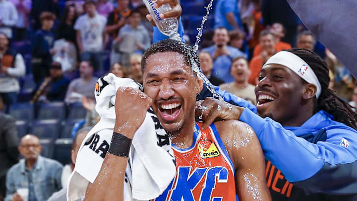 Feb 1, 2025; Oklahoma City, Oklahoma, USA; Oklahoma City Thunder guard Aaron Wiggins (21) gets water poured on him by his teammates after his performance against the Sacramento Kings during the second half at Paycom Center. Mandatory Credit: Alonzo Adams-Imagn Images Feb 1, 2025; Oklahoma City, Oklahoma, USA; Oklahoma City Thunder guard Aaron Wiggins (21) gets water poured on him by his teammates after his performance against the Sacramento Kings during the second half at Paycom Center. Mandatory Credit: Alonzo Adams-Imagn Images