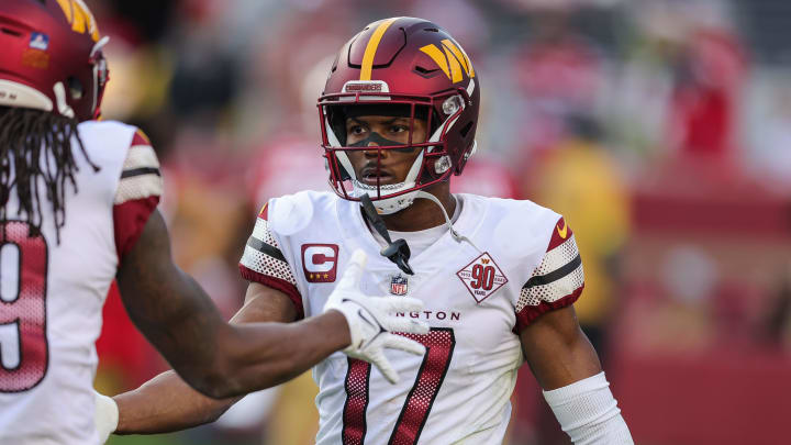 Dec 24, 2022; Santa Clara, California, USA; Washington Commanders wide receiver Terry McLaurin (17) celebrates with wide receiver Cam Sims (89) after scoring a touchdown during the third quarter against the San Francisco 49ers at Levi's Stadium. Mandatory Credit: Sergio Estrada-USA TODAY Sports